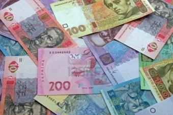 НБУ на 23 червня трохи послабив курс гривні до 26,02 грн/долар