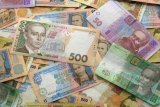НБУ на 28 августа ослабил курс гривны до 25,55 грн/доллар
