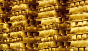 Золото дешевшає на тлі зростаючих очікувань підвищення ставки ФРС