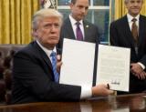 Trump Signs Order on Reduction of Federal Business Regulation