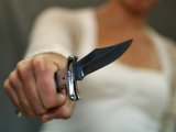 У Києві дівчина з ножем пограбувала обмінник