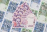 Гривня зміцнилася на закритті міжбанку