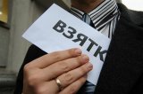 У Київській області начальника юрвідділу райдержадміністрації затримали за підозрою у вимаганні $100 тисяч