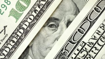 Гривня на межбанке ослабла к доллару