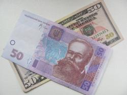 Курс гривны на межбанке приблизился к отметке 10 грн./долл.