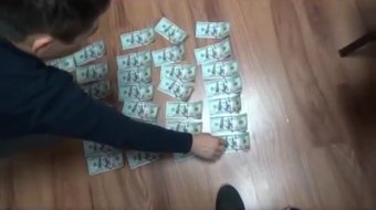 Офицер службы экономических расследований Казахстана подозревается в получении взятки
