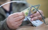 Міжбанк відкрився знеціненням долара