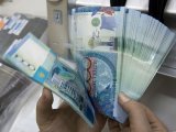 В какие страны переводят больше всего денег из Казахстана
