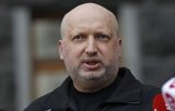 Турчинов в июле заработал тройной оклад, но меньше своих заместителей